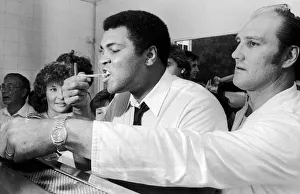 Muhammad Ali visits retired boxer Jack Bodell at his Fish and Chip Shop in Coventry