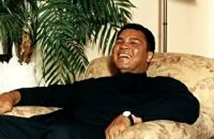 Images Dated 7th August 1992: Muhummed Ali (Cassius Clay) Boxer in armchair. August 1992