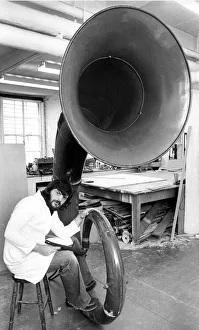 00116 Prints: Museum technician Richard Miller was to knock out the dents in this giant auyetephone