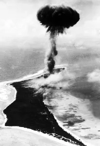 Mushroom cloud rises from Japanese ammunition dump on Kwajalein Atoll in