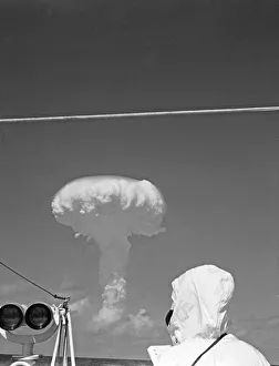 Binoculars Prints: A mushroom cloud rises over the Pacific moments after the detonation of Britain