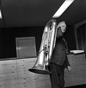Puzzled Prints: Music Instruments: Joe Moden caretaker of the Haslingden Public Hall has symphonic