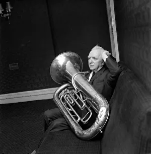 Puzzled Prints: Music Instruments: Joe Moden caretaker of the Haslingden Public Hall has symphonic