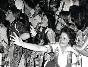 Images Dated 17th September 1976: Music - Pop - Bay City Rollers - Hysterical Rollers fans reach out for their idols