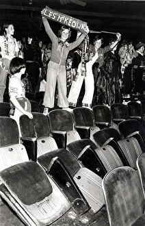 Images Dated 17th September 1976: Music - Pop - Bay City Rollers - Loyal fans cheer the band behind some of the broken