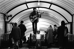 Underground Prints: A musician busking at Oxford Circus Station - February 1987 standing