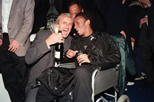 Annual Prints: Musician Tricky, in a wheelchair pictured with another guest at the Brit Music Awards
