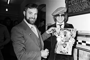 Chairman Prints: Musician and Watford FC chairman Elton John is presented with a special Jubilee plaque