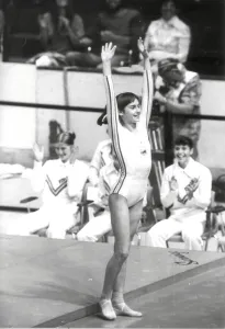 Floor Prints: Nadia Comaneci of Romania salutes after a prefect gymnastic score of 10