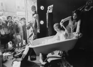 Weird Prints: A naked man taking a bath in the window of the Sir larry boutique In Kensington London