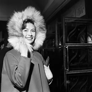 Coat Prints: Nanette Newman at the film premiere of The Captains Table