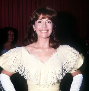 Portra Prints: Nanette Newman at premiere International Velvet lace trimmed dress MSI