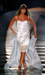 1990s Fashion Prints: Naomi Campbell modelling a white slip dress March 1999 for designer Rocco Barocco