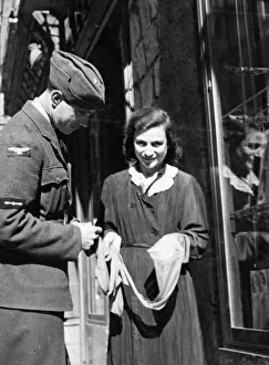 Naples in Southern Italy, with its open shops displaying gloves, handbags