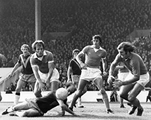A narrow escape for Manchester City as keeper Joe Corrigan comes out of goal to foil