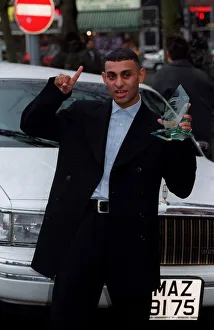 Naseem Hamed Boxing October 98 WBO Featherweight champion standing next to white