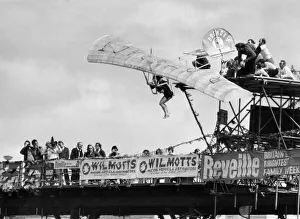 Plane Prints: The national birdman rally on Bognor Pier in Sussex Sue Kerr shows off plummet
