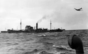 00033 Prints: A Nazi bomber sweeps out of the clouds to attack a convoy in the mid Atlantic