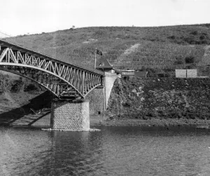 01437 Prints: Nazi pennant flying over Customs House on the German side of Wormeldange Bridge which