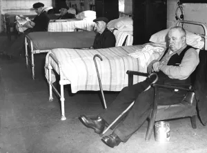 Nearest the camera is William Prisk. Beside him is Jack Simmons in their dormitory