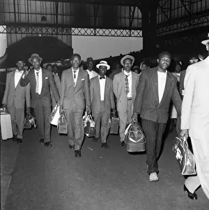1961 Prints: Nearly 1000 West Indian immigrants arrive in three boats trains at Waterloo Station