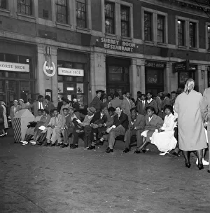 01167 Prints: Nearly 1000 West Indian immigrants arrive in three boats trains at Waterloo Station