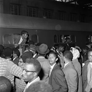 01167 Prints: Nearly 1000 West Indian immigrants arrive in three boats trains at Waterloo Station