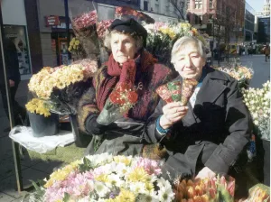 Unhappy Prints: Nellie Halsted (left) the oldest flower girl in the country seen here at her Market