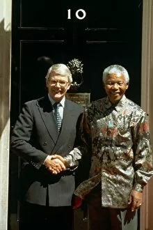 00175 Collection: Nelson Mandela shakes hands with Prime Minister John Major at 10 Downing Street during