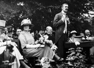 Neville Chamberlain agives a speech to his local conservative association with wife MSI