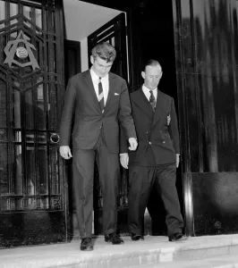 New Arsenal signing Joe Baker leaving Highbury with Arsenal team physiotherapist Bertie