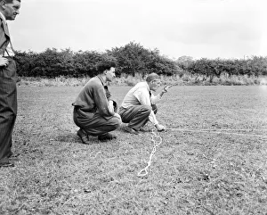 Transfer Prints: New Derby County manager Harry Storey (centre) with new player at the club