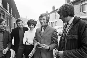 Transfer Prints: New Derby County signing Colin Todd signs autographs for fans as he arrives