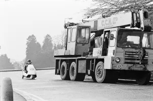 Motoring Prints: The New Electric Vehicle 14 year old Joe Paine from London trying out Sir