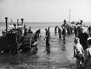 1950 Prints: The new Liverpool Class Newbiggin lifeboat Richard Ashley is towed out of the shallows by