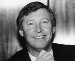 00468 Prints: New Manchester United manager Alex Ferguson smiles after his appointment at Old Trafford