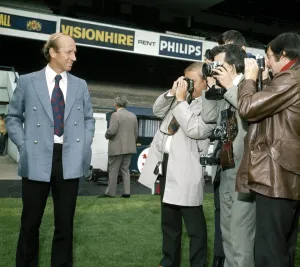 New Preston North End manager Bobby Charlton meets press cameramen at the club