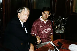 New signing Graeme Hogg with Hearts Manager Wallace Mercer at Tynecastle in Edinburgh