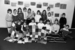 Knitting Prints: New Mill Sunday school children display the blankets they have knitted for Ethiopia
