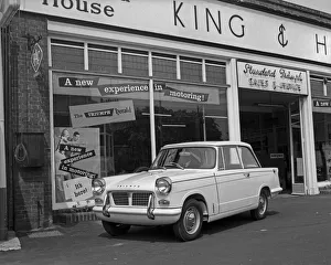 A new Triumph Herald leaves the showrooms of King and Harper on Milton Road Cambridge May