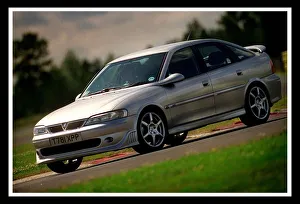 Vauxhall Prints: NEW VAUXHALL GSI CAR SILVER ALLOY WHEELS JULY 1999 FOR ROAD RECORD