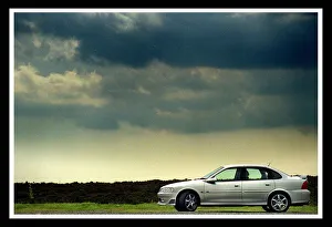 00143 Prints: NEW VAUXHALL GSI CAR SILVER ALLOY WHEELS JULY 1999 FOR ROAD RECORD