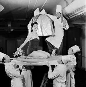 00019 Prints: New Year Celebrations - Chefs at the Kensington Palace Hotel prepare a woman