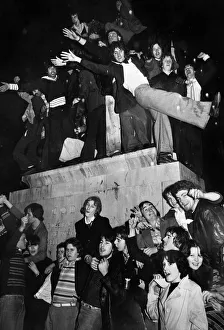 00753 Prints: New Year revellers besiege the statue of Lady Godiva during the celebrations to see in