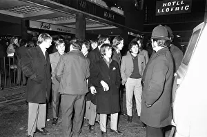 New Year revellers chat with the police outside the Hotel Leofric. 31st December 1971