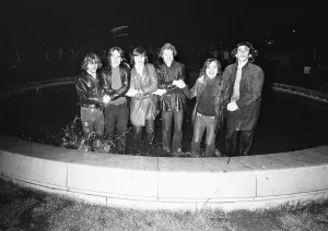 New Year Revellers seeing in 1973 by taking a quick dip in the fountain in Centenary