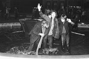 New Year Revellers seeing in 1973 by taking a quick dip in the fountain in Centenary