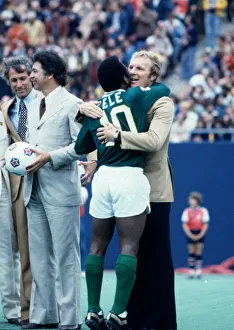 New York Cosmos star Pele hugs his long time friend Bobby Moore after playing his final