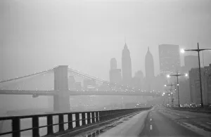 Cityscape Prints: New York skyline and Brooklyn Bridge seen from the FDR Drive freeway, Manhattan, New York