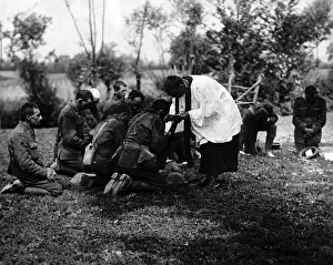 New Zealand chaplain celebrating Holy Communion in a field near the Front Line in France